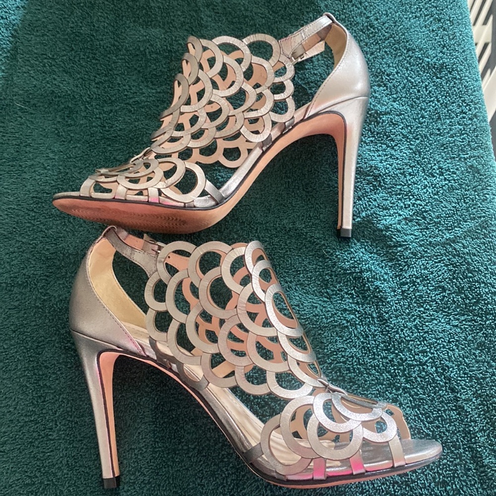Size 8 silver leather open toe cut out shoes with ankle strap and 4” heel